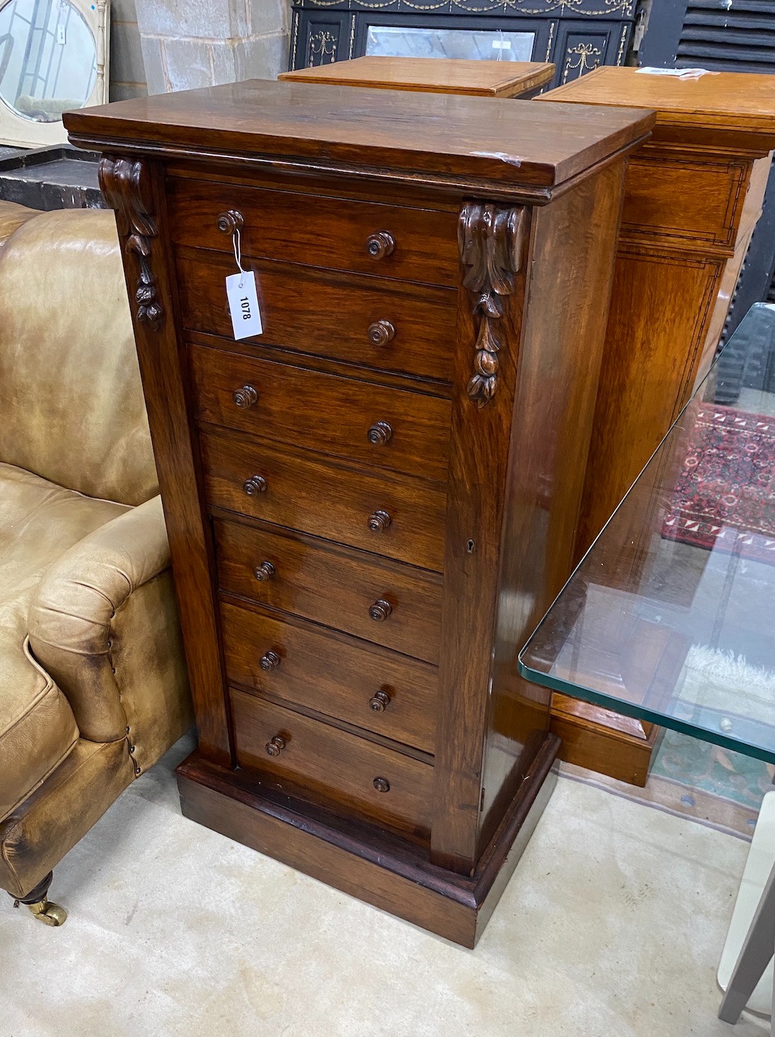 A Victorian rosewood Wellington chest of seven drawers, width 56cm, depth 36cm, height 113cm